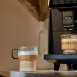 Grooved latte glass with a green handle CHiATO, 300 ml – Transparent
